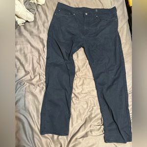Levi’s navy 502 pre-owned, men’s size 36/30. There’s a snag on the left leg/tear